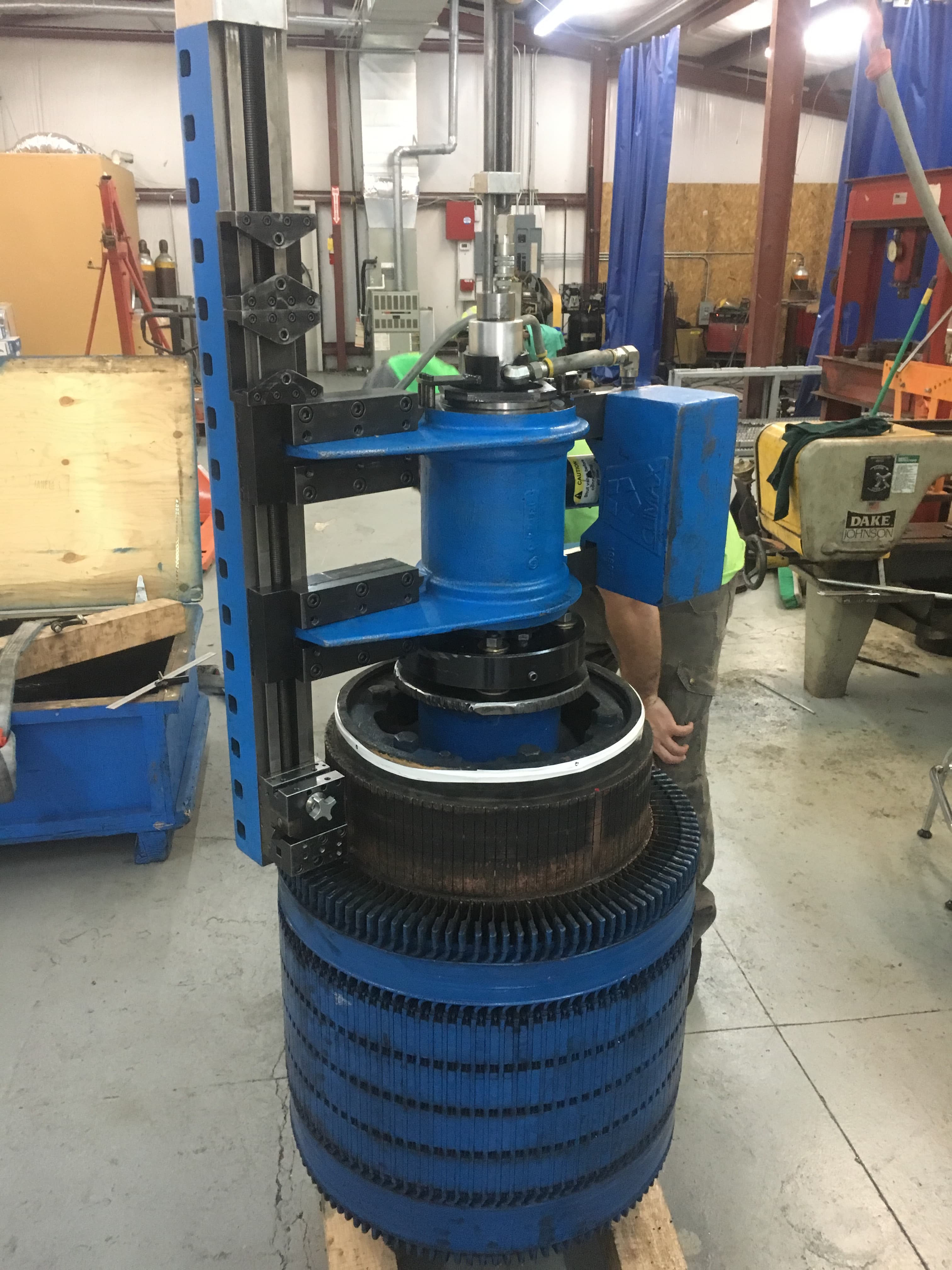 Hydro components staged for disassembly and reassembly support.