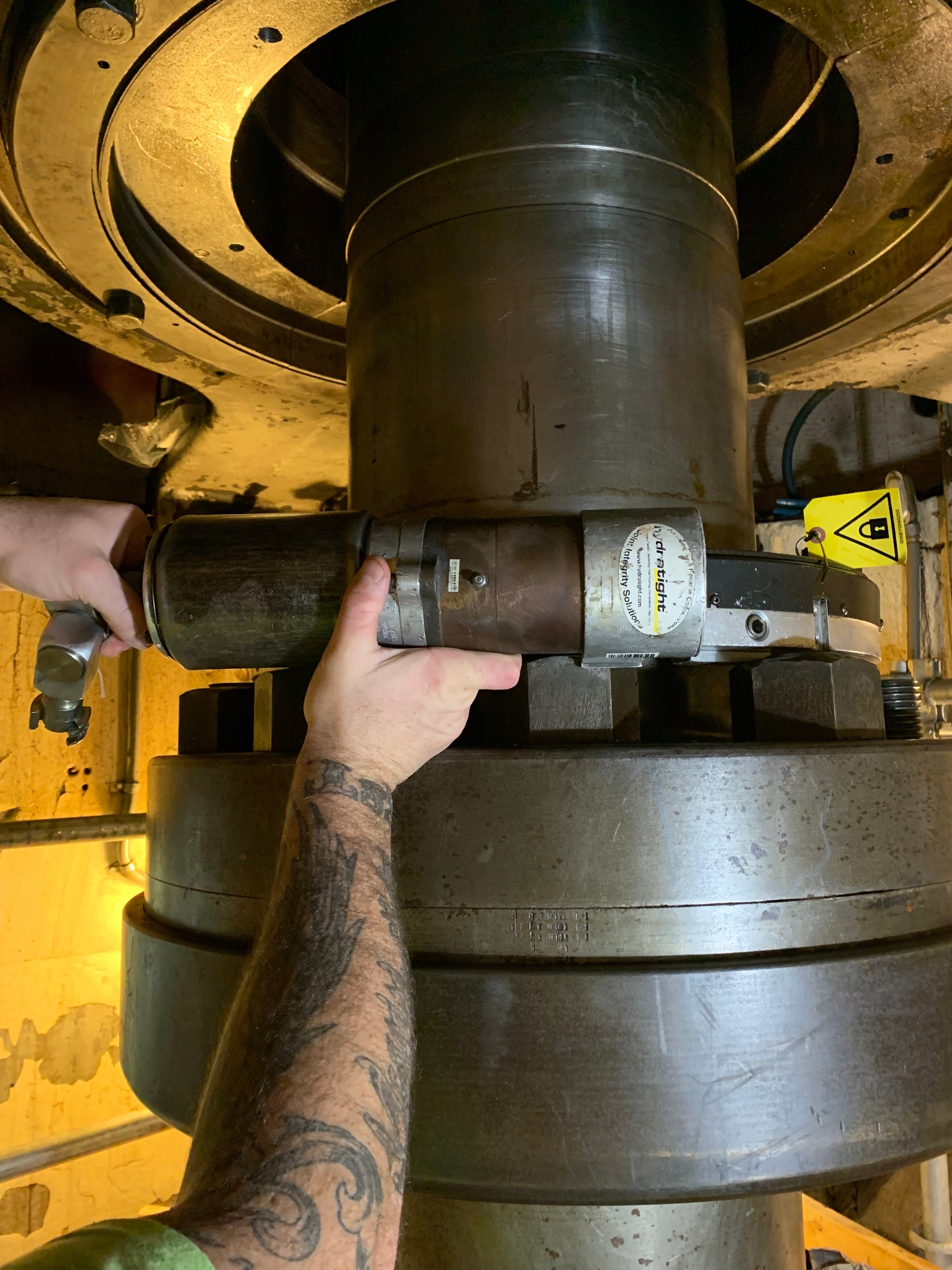 Portable field machining setup at a hydro site.